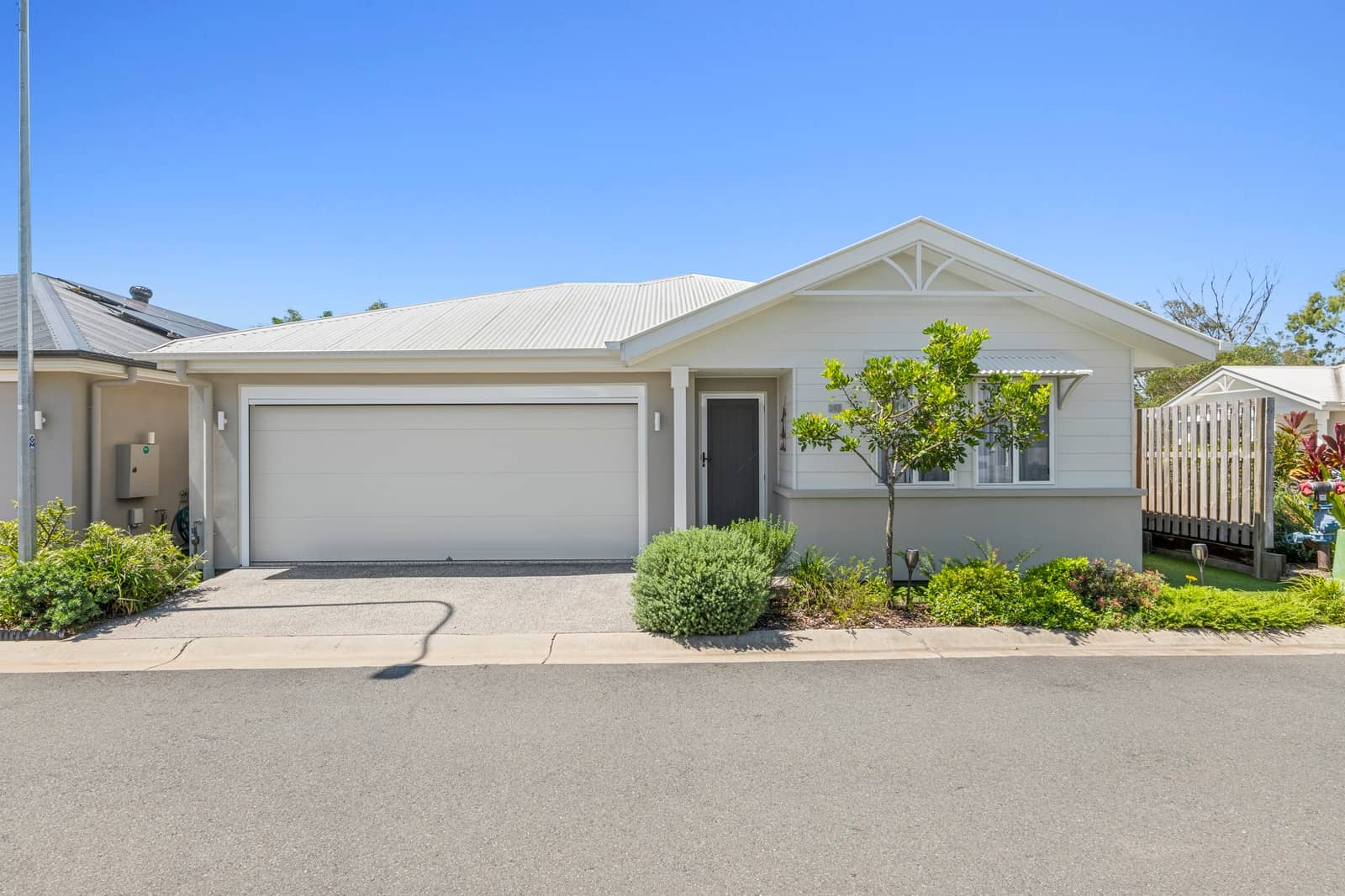 Ingenia Lifestyle home with garage and garden, in a community setting.