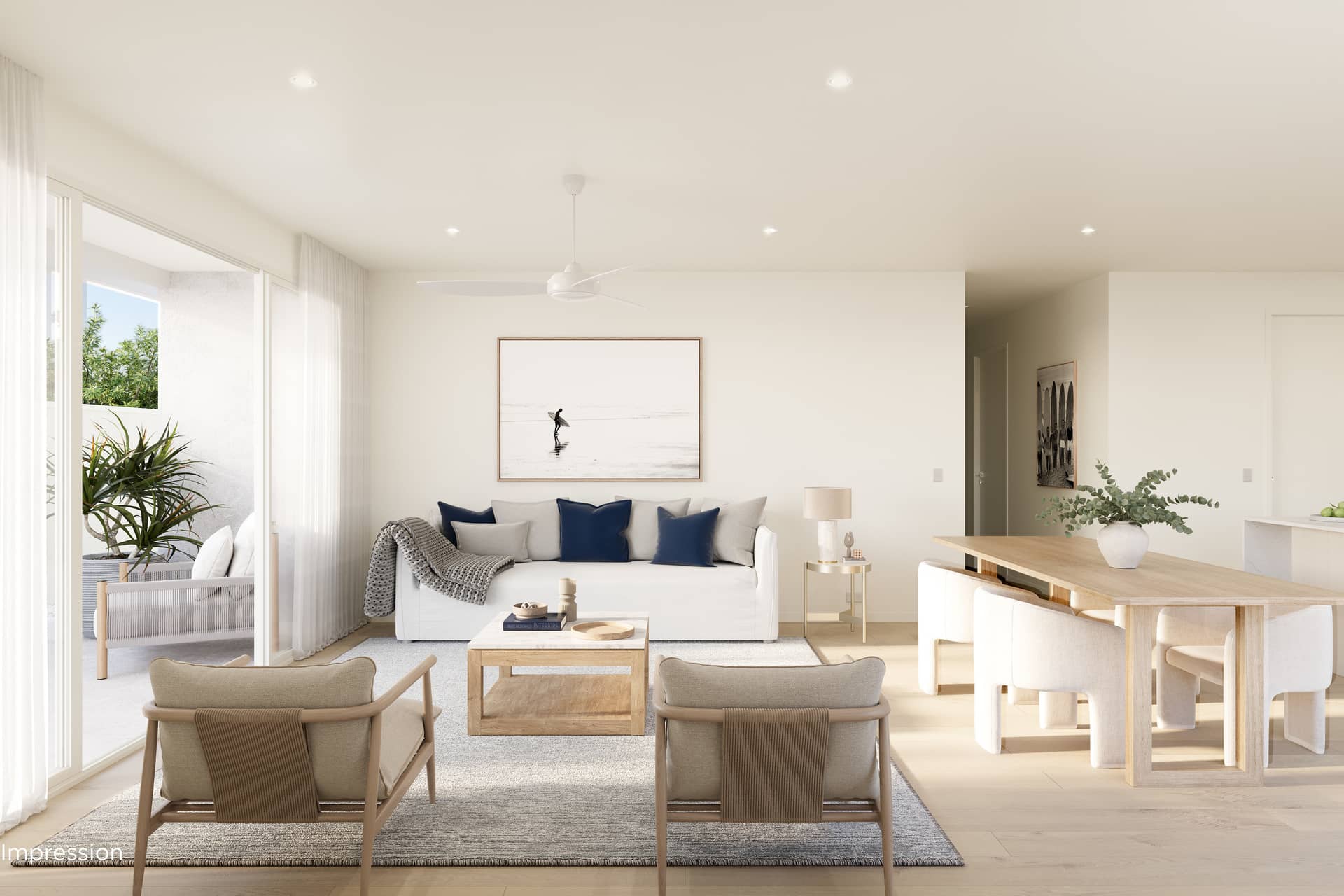 A modern open-plan living and dining area of an Ingenia Lifestyle home, with a sofa, dining table, and glass doors opening to a private balcony.