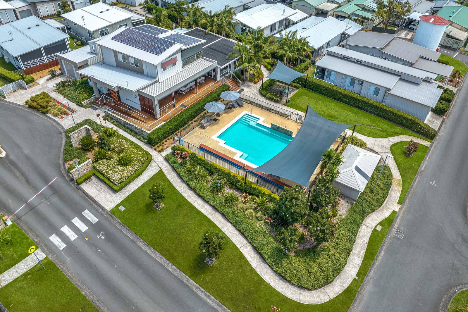Aerial view of an Ingenia Lifestyle community pool and resort-style amenities.