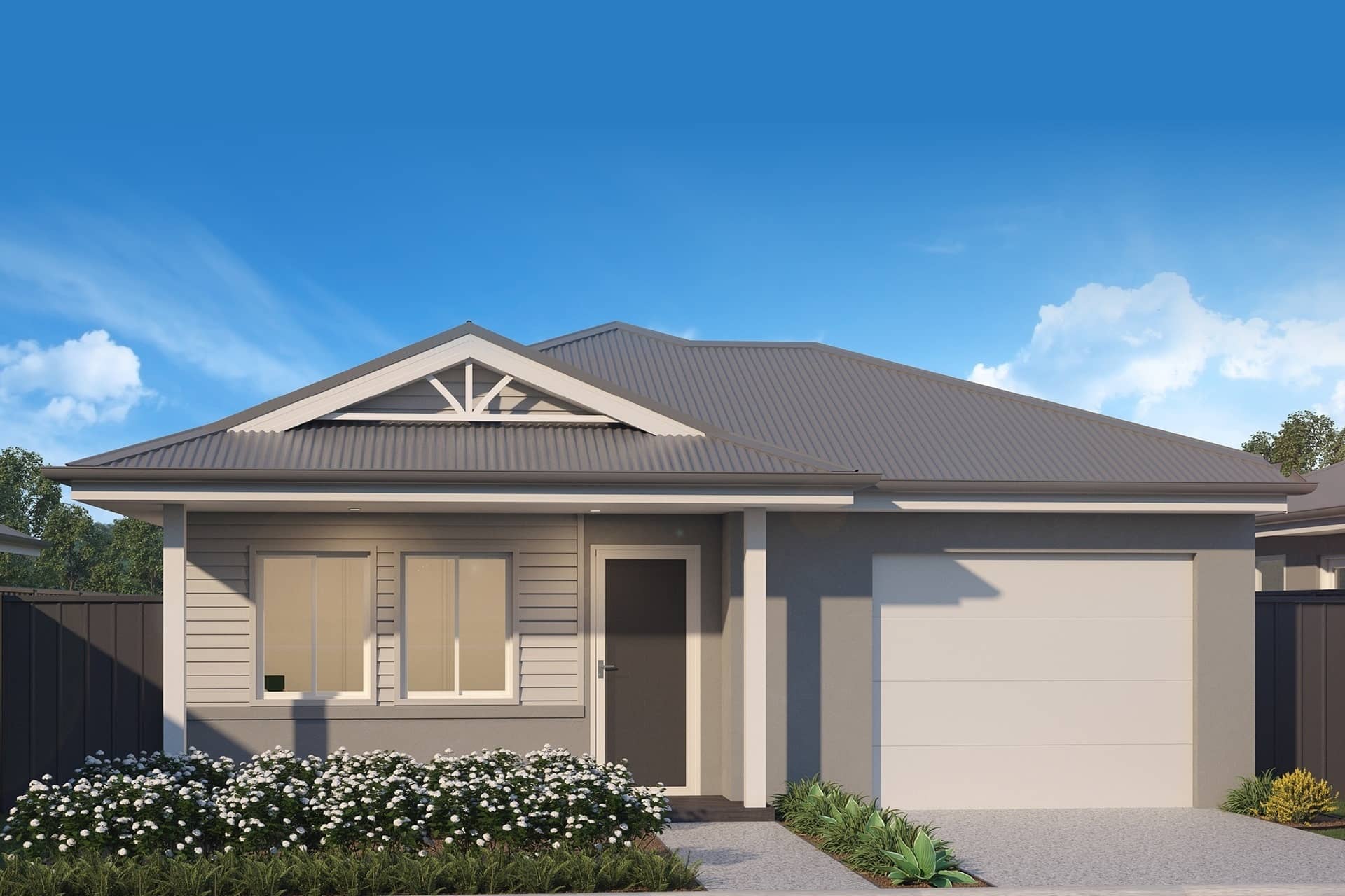 A modern Ingenia Lifestyle home with a grey roof, siding, and a light-coloured garage door.