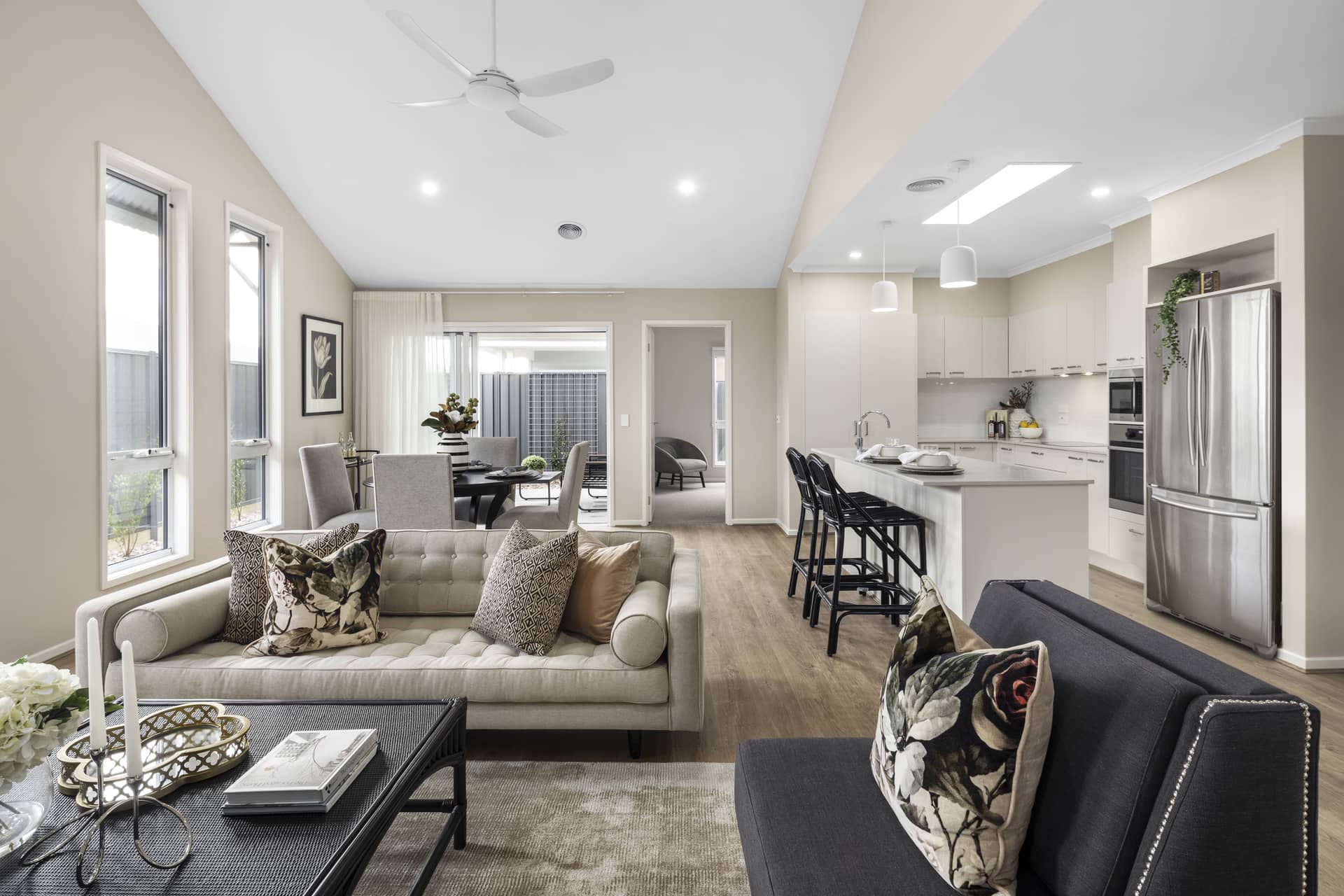 Interior view of an open-plan Ingenia Lifestyle community home, featuring a lounge and kitchen.