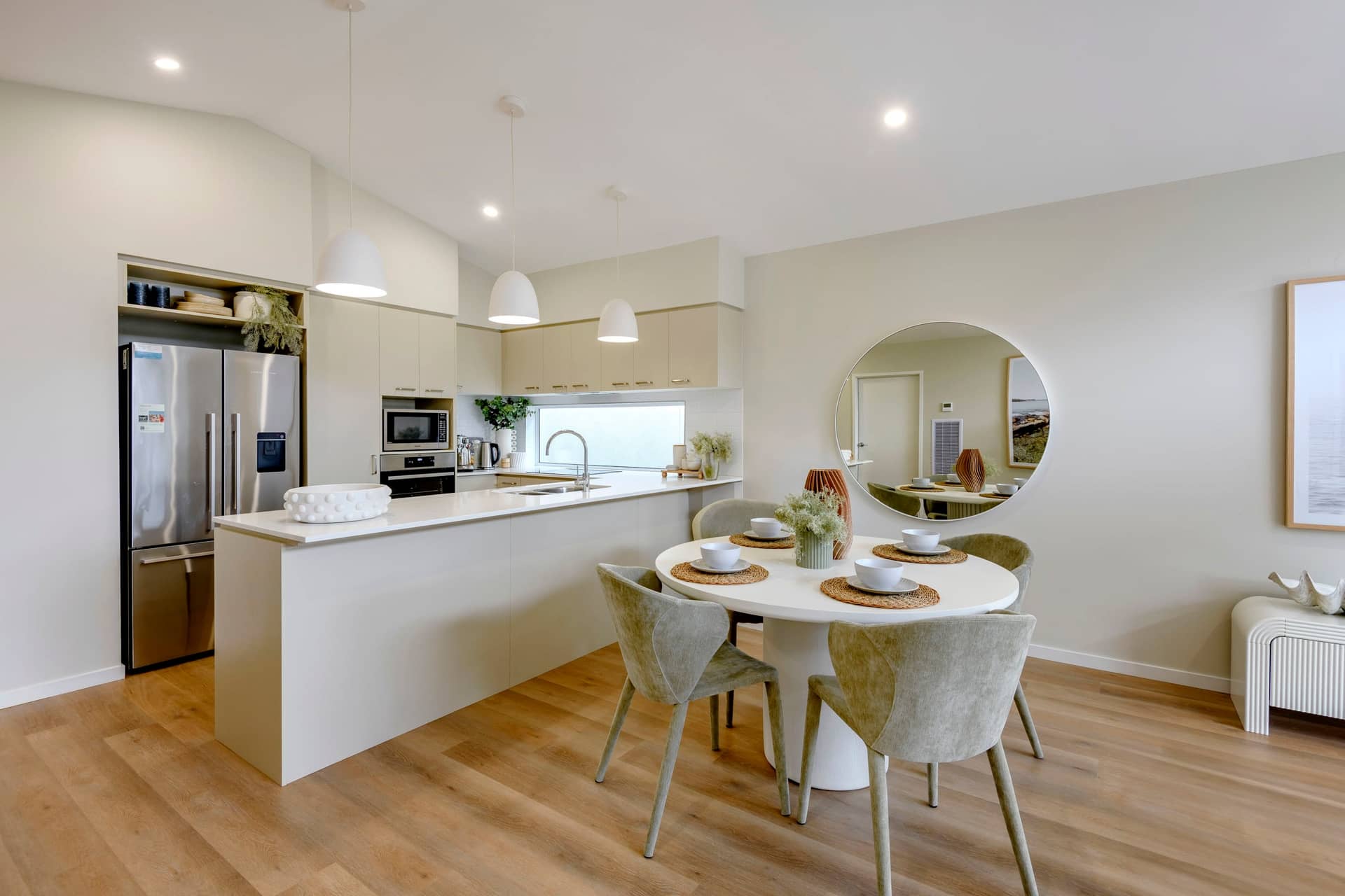 A modern kitchen and dining area in an Ingenia Lifestyle community home.