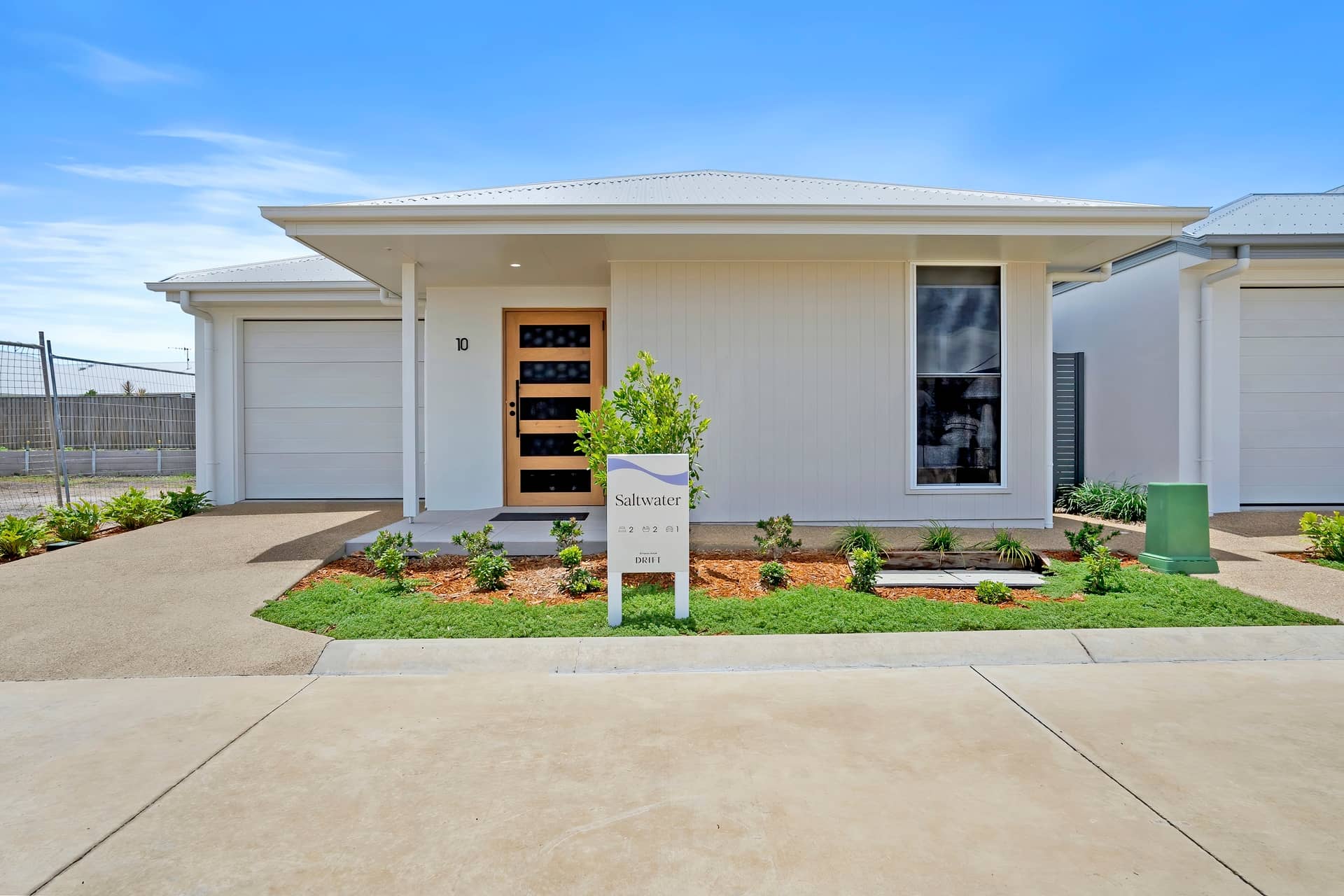 Ingenia Lifestyle community, Saltwater, land lease home with a modern facade, garage and low-maintenance garden.
