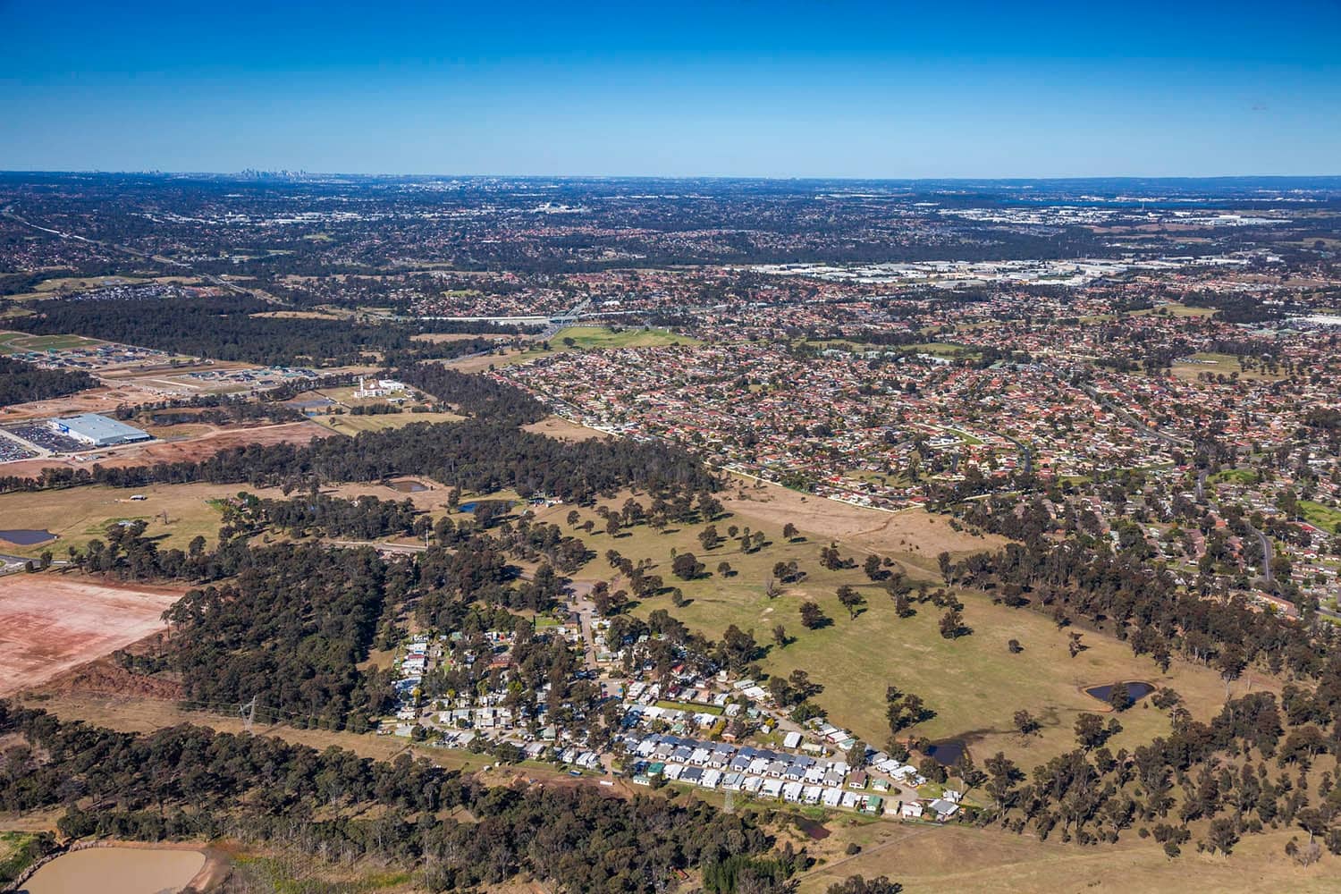 Aerial view of an Ingenia Lifestyle community nestled within a suburban landscape.