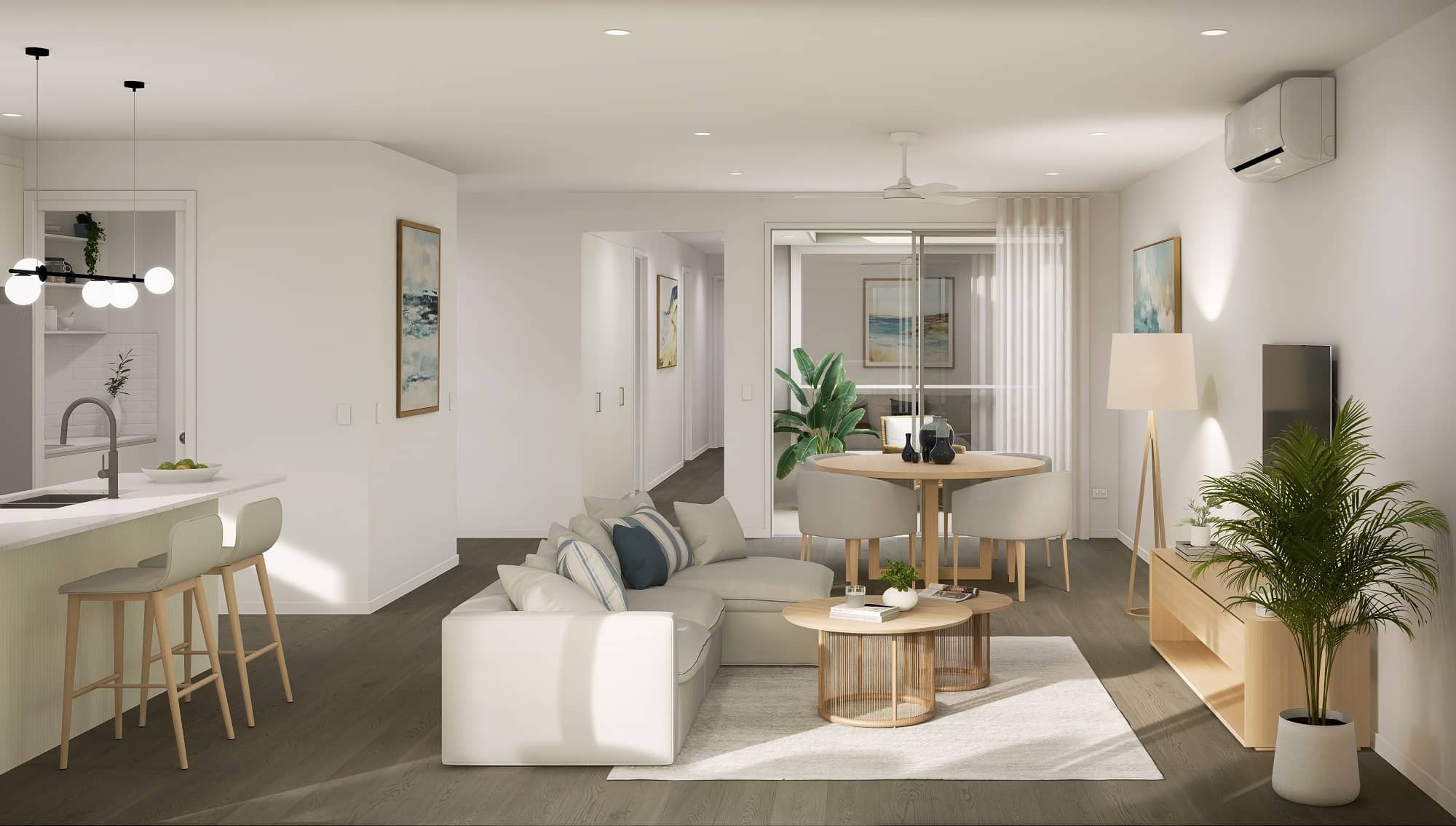 An open-plan living area in an Ingenia Lifestyle community home, featuring a kitchen island, lounge and dining areas.