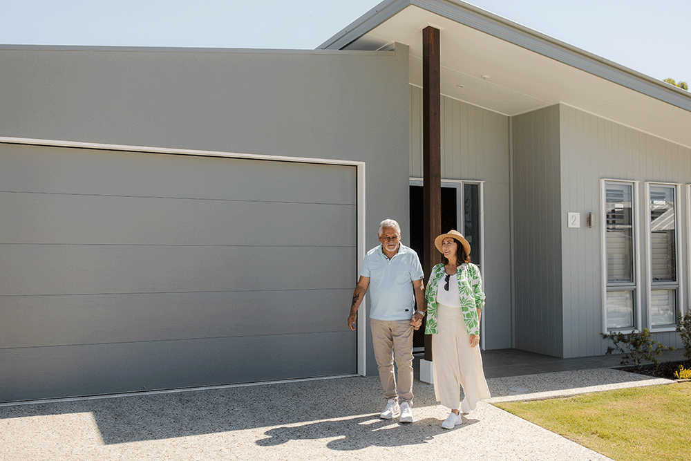 Ingenia Lifestyle Sanctuary - Couple standing in front of a house