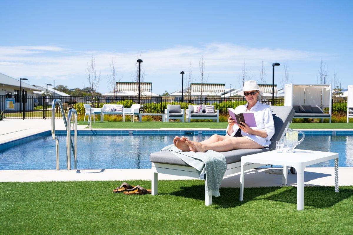 Ingenia Lifestyle Latitude One - Man sitting by the pool